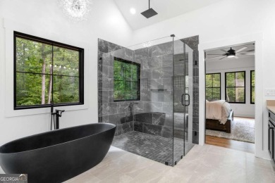 nWelcome to this stunning Craftsman home nestled on a beautiful on The Club River Forest in Georgia - for sale on GolfHomes.com, golf home, golf lot