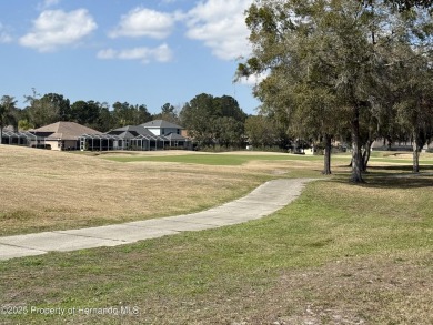 PRICED TO SELL MAINTENANCE FREE VILLA FREESTANDING HOME ON THE on Hernando Oaks Golf and Country Club in Florida - for sale on GolfHomes.com, golf home, golf lot