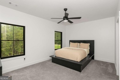 nWelcome to this stunning Craftsman home nestled on a beautiful on The Club River Forest in Georgia - for sale on GolfHomes.com, golf home, golf lot