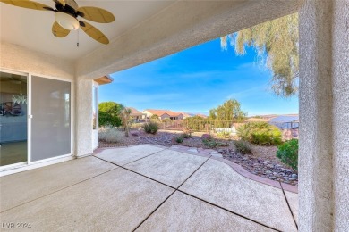 Immaculate Trenton model with mountain & city views! This on Revere Golf Club in Nevada - for sale on GolfHomes.com, golf home, golf lot