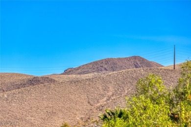 Immaculate Trenton model with mountain & city views! This on Revere Golf Club in Nevada - for sale on GolfHomes.com, golf home, golf lot