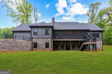 nWelcome to this stunning Craftsman home nestled on a beautiful on The Club River Forest in Georgia - for sale on GolfHomes.com, golf home, golf lot