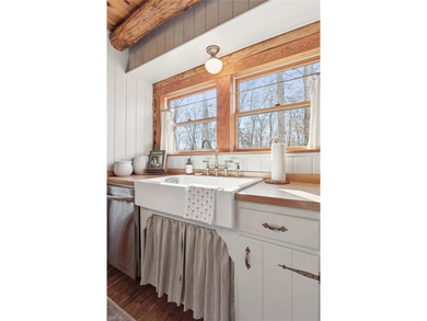 Entering into 322 Fairfield, you are engulfed in warmth.  This on Piankatank River Golf Club in Virginia - for sale on GolfHomes.com, golf home, golf lot