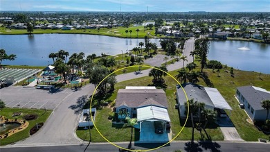 This amazing TRIPLE-wide Palm Harbor home is situated on a on Maple Leaf Golf and Country Club in Florida - for sale on GolfHomes.com, golf home, golf lot