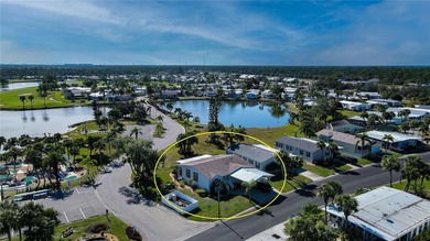 This amazing TRIPLE-wide Palm Harbor home is situated on a on Maple Leaf Golf and Country Club in Florida - for sale on GolfHomes.com, golf home, golf lot