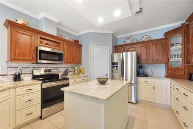 This amazing TRIPLE-wide Palm Harbor home is situated on a on Maple Leaf Golf and Country Club in Florida - for sale on GolfHomes.com, golf home, golf lot