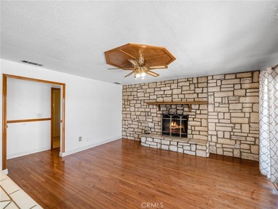 This 1987 built 2,032 sq ft home offers a common room with an on Silver Lakes Golf Course in California - for sale on GolfHomes.com, golf home, golf lot