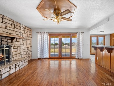 This 1987 built 2,032 sq ft home offers a common room with an on Silver Lakes Golf Course in California - for sale on GolfHomes.com, golf home, golf lot