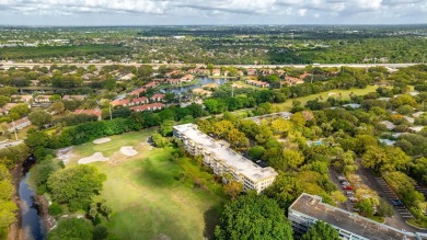 PALM AIRE COUNTRY CLUB in POMPANO BEACH in CYPRESS GROVE. THIS 3 on Oaks Country Club in Florida - for sale on GolfHomes.com, golf home, golf lot