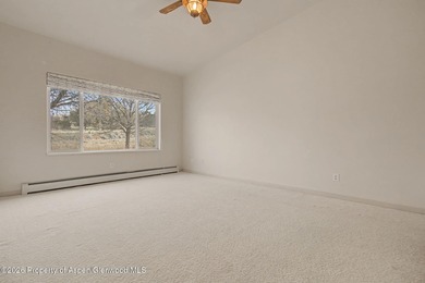 Welcome home to this immaculate townhome where comfort, style on Battlement Mesa Golf Course in Colorado - for sale on GolfHomes.com, golf home, golf lot