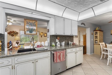 Welcome to this beautifully maintained 2-bedroom, 2-bath home on Mainlands Golf Club in Florida - for sale on GolfHomes.com, golf home, golf lot