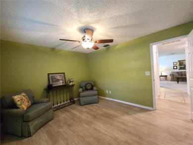 UPDATED 3-bedroom home located in a popular adult golf community on Highland Lakes Executive Golf Course in Florida - for sale on GolfHomes.com, golf home, golf lot