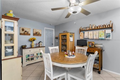 Welcome to this beautifully maintained 2-bedroom, 2-bath home on Mainlands Golf Club in Florida - for sale on GolfHomes.com, golf home, golf lot