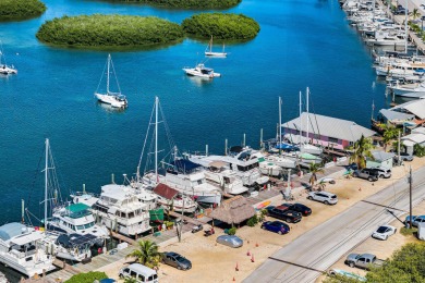 Don't miss this rare, 85', live-aboard slip with OWNED BAY on Sombrero Golf and Country Club in Florida - for sale on GolfHomes.com, golf home, golf lot