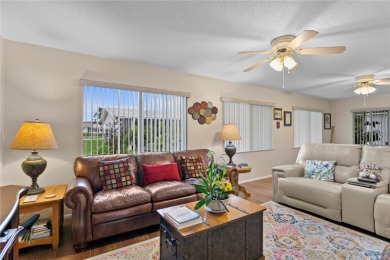 Welcome to this beautifully maintained 2-bedroom, 2-bath home on Mainlands Golf Club in Florida - for sale on GolfHomes.com, golf home, golf lot