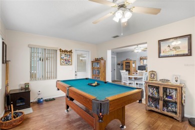 Welcome to this beautifully maintained 2-bedroom, 2-bath home on Mainlands Golf Club in Florida - for sale on GolfHomes.com, golf home, golf lot
