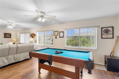 Welcome to this beautifully maintained 2-bedroom, 2-bath home on Mainlands Golf Club in Florida - for sale on GolfHomes.com, golf home, golf lot
