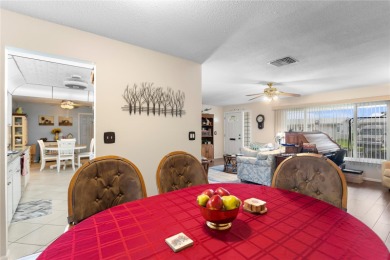 Welcome to this beautifully maintained 2-bedroom, 2-bath home on Mainlands Golf Club in Florida - for sale on GolfHomes.com, golf home, golf lot