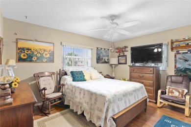 Welcome to this beautifully maintained 2-bedroom, 2-bath home on Mainlands Golf Club in Florida - for sale on GolfHomes.com, golf home, golf lot