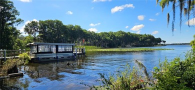 UPDATED 3-bedroom home located in a popular adult golf community on Highland Lakes Executive Golf Course in Florida - for sale on GolfHomes.com, golf home, golf lot