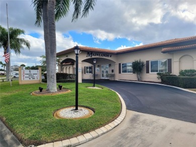 Welcome to this beautifully maintained 2-bedroom, 2-bath home on Mainlands Golf Club in Florida - for sale on GolfHomes.com, golf home, golf lot