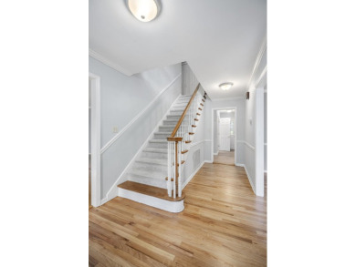 Stunning 4-bedroom, 3-bathroom brick residence situated on a on Woodside Plantation Country Club in South Carolina - for sale on GolfHomes.com, golf home, golf lot