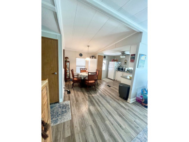 This well-maintained two-bedroom, two-bathroom residence offers on Pine Lakes Country Club in Florida - for sale on GolfHomes.com, golf home, golf lot