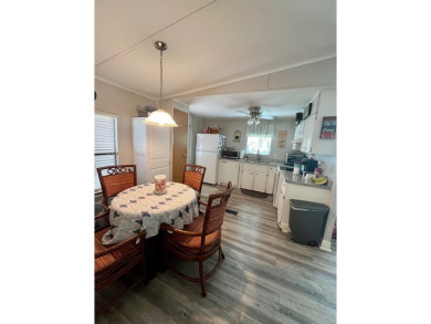 This well-maintained two-bedroom, two-bathroom residence offers on Pine Lakes Country Club in Florida - for sale on GolfHomes.com, golf home, golf lot