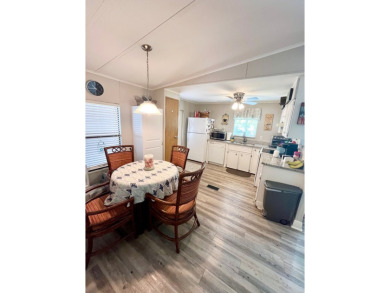 This well-maintained two-bedroom, two-bathroom residence offers on Pine Lakes Country Club in Florida - for sale on GolfHomes.com, golf home, golf lot