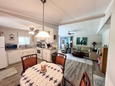 This well-maintained two-bedroom, two-bathroom residence offers on Pine Lakes Country Club in Florida - for sale on GolfHomes.com, golf home, golf lot
