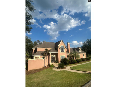 Welcome to 217 Muirfield Way, a breathtaking custom-built on Golden Hills Golf and Country Club in South Carolina - for sale on GolfHomes.com, golf home, golf lot