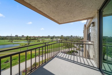Under contract-accepting backup offers. Waterviews and golf on Isla Del Sol Yacht and Country Club in Florida - for sale on GolfHomes.com, golf home, golf lot