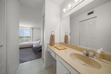 Under contract-accepting backup offers. Waterviews and golf on Isla Del Sol Yacht and Country Club in Florida - for sale on GolfHomes.com, golf home, golf lot