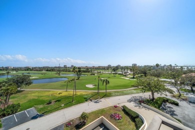 Under contract-accepting backup offers. Waterviews and golf on Isla Del Sol Yacht and Country Club in Florida - for sale on GolfHomes.com, golf home, golf lot