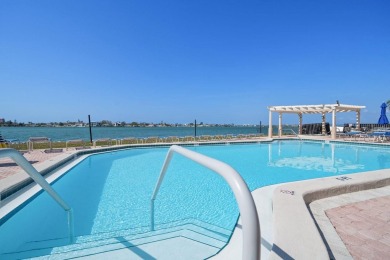 Under contract-accepting backup offers. Waterviews and golf on Isla Del Sol Yacht and Country Club in Florida - for sale on GolfHomes.com, golf home, golf lot