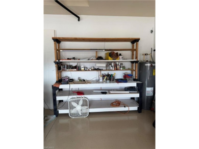 This beautiful 4-bedroom home includes a Golf Membership at the on Bonita National Golf Course in Florida - for sale on GolfHomes.com, golf home, golf lot