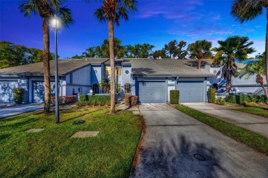 Welcome to this beautifully updated 2-bedroom, 2.5-bath townhome on Northdale Golf and Tennis Club in Florida - for sale on GolfHomes.com, golf home, golf lot
