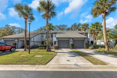 Welcome to this beautifully updated 2-bedroom, 2.5-bath townhome on Northdale Golf and Tennis Club in Florida - for sale on GolfHomes.com, golf home, golf lot