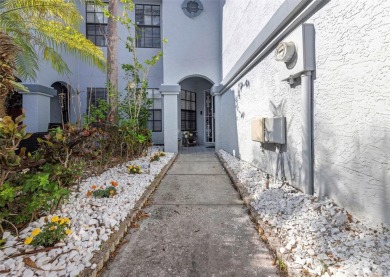 Welcome to this beautifully updated 2-bedroom, 2.5-bath townhome on Northdale Golf and Tennis Club in Florida - for sale on GolfHomes.com, golf home, golf lot