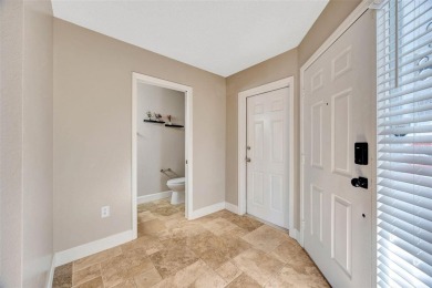 Welcome to this beautifully updated 2-bedroom, 2.5-bath townhome on Northdale Golf and Tennis Club in Florida - for sale on GolfHomes.com, golf home, golf lot