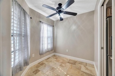 Welcome to this beautifully updated 2-bedroom, 2.5-bath townhome on Northdale Golf and Tennis Club in Florida - for sale on GolfHomes.com, golf home, golf lot