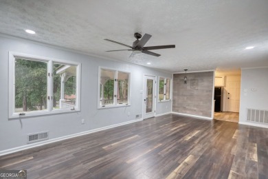 Welcome to this stunning, fully renovated home in the highly on Turtle Cove Golf Course in Georgia - for sale on GolfHomes.com, golf home, golf lot