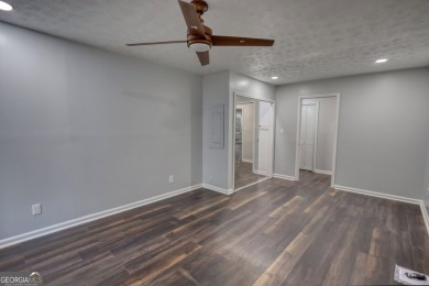 Welcome to this stunning, fully renovated home in the highly on Turtle Cove Golf Course in Georgia - for sale on GolfHomes.com, golf home, golf lot