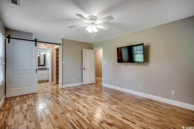 Welcome to this classic 3-bedroom, 2.5-bath brick home in the on The Dunes Golf and Beach Club in South Carolina - for sale on GolfHomes.com, golf home, golf lot