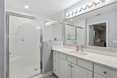 Enjoy easy Florida living in this top-floor, 2-bedroom, 2-bath on Miromar Lakes Golf Club in Florida - for sale on GolfHomes.com, golf home, golf lot