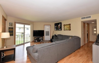 Enjoy open-concept living in this modern upper-level condo on BlackStone Creek Golf Club in Wisconsin - for sale on GolfHomes.com, golf home, golf lot