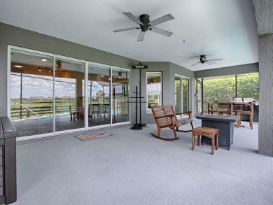 BOND PAID on this STUNNING 3/2 IRIS with SALT WATER HEATED POOL on Evans Prairie Golf and Country Club in Florida - for sale on GolfHomes.com, golf home, golf lot