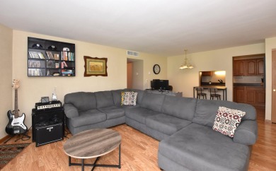 Enjoy open-concept living in this modern upper-level condo on BlackStone Creek Golf Club in Wisconsin - for sale on GolfHomes.com, golf home, golf lot