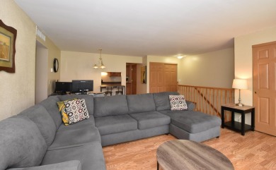 Enjoy open-concept living in this modern upper-level condo on BlackStone Creek Golf Club in Wisconsin - for sale on GolfHomes.com, golf home, golf lot