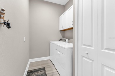 One or more photo(s) has been virtually staged. Better than new on Kings Gate Golf Club in Florida - for sale on GolfHomes.com, golf home, golf lot